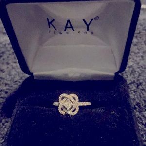 Diamond knot ring from Kay Jewelers. Matches the necklace and ring listed.